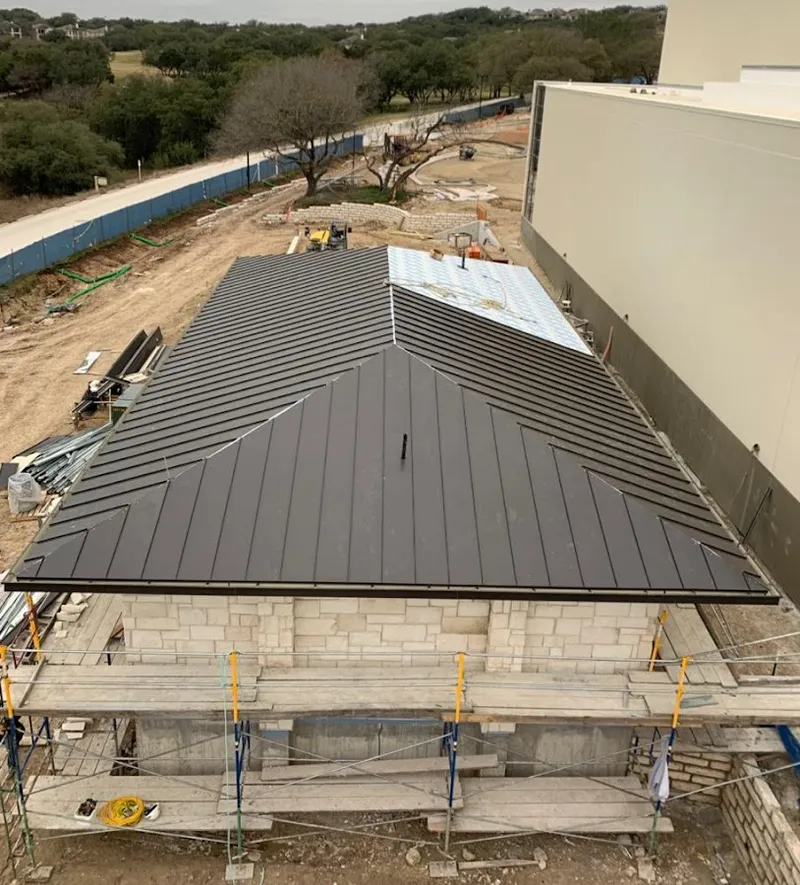Metal roof new construction with scaffolding in Marion